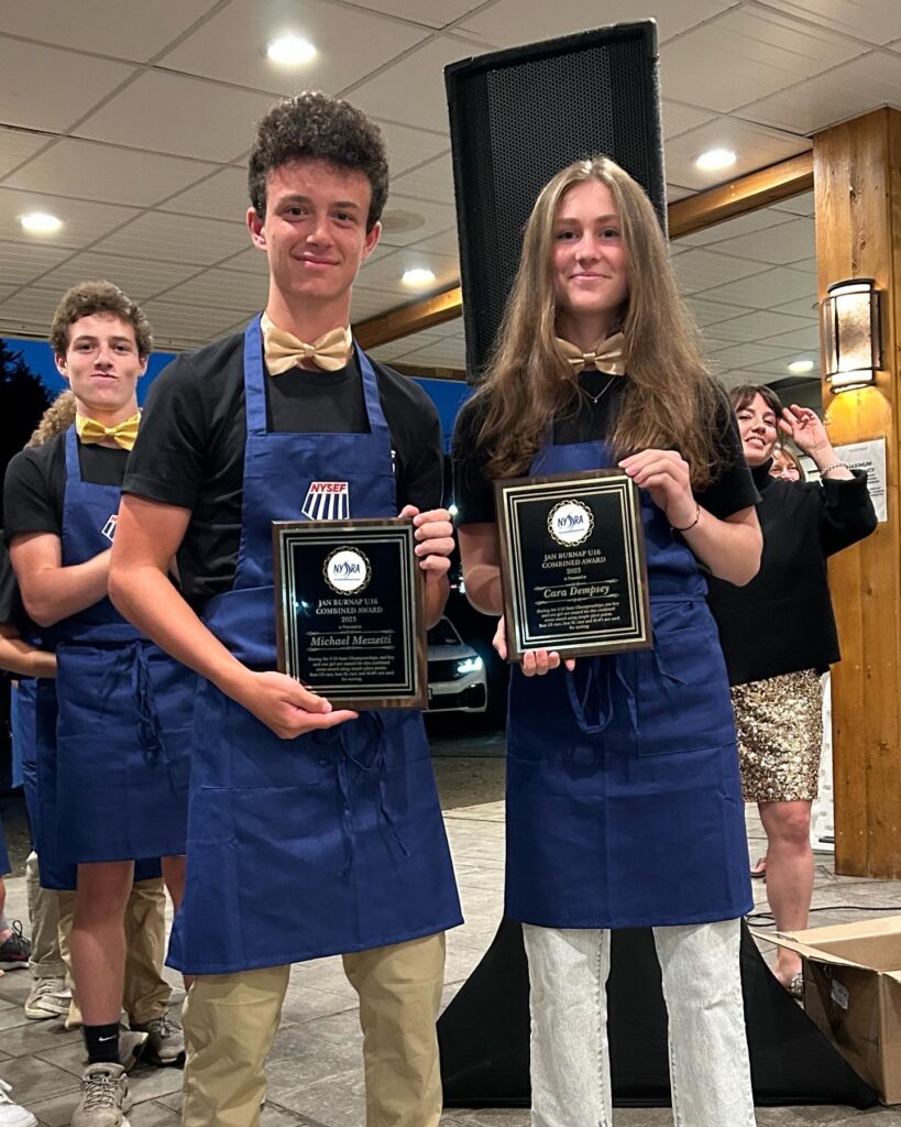 two athletes accept awards at the nysef summer benefit