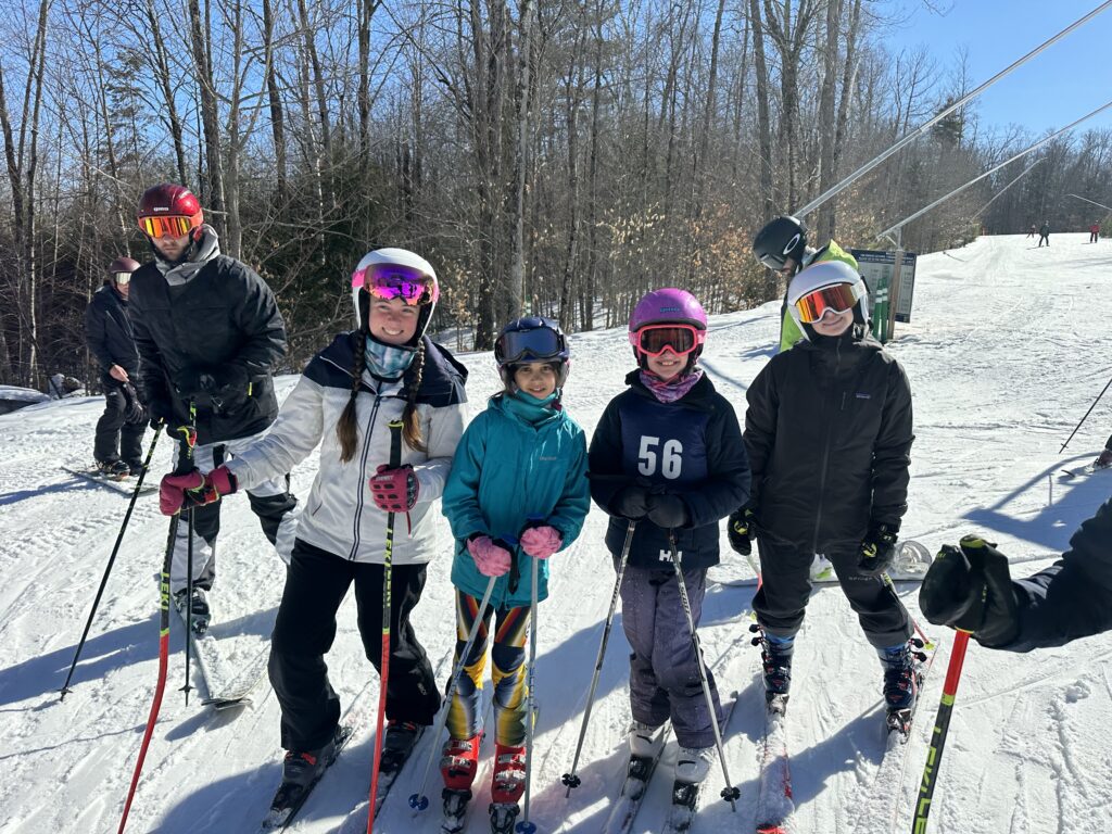group of kids on skis